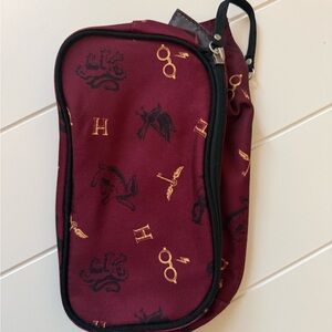 Stylish Maroon Toiletry Bag with Iconic Patterns